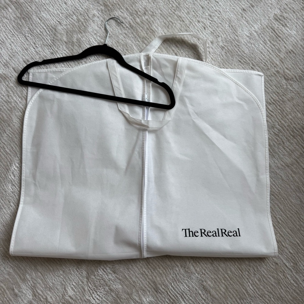 The Real Real White Garment Bag with Black Velvet Hanger